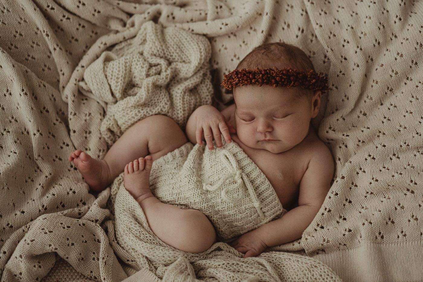 Babyfoto beim Fotoshooting mit neugeborenen Baby aus Kerpen und Köln